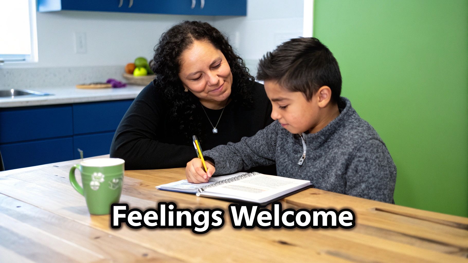 A mother looks at her son writing in a notebook on a wooden table, with text 'Feelings Welcome'.