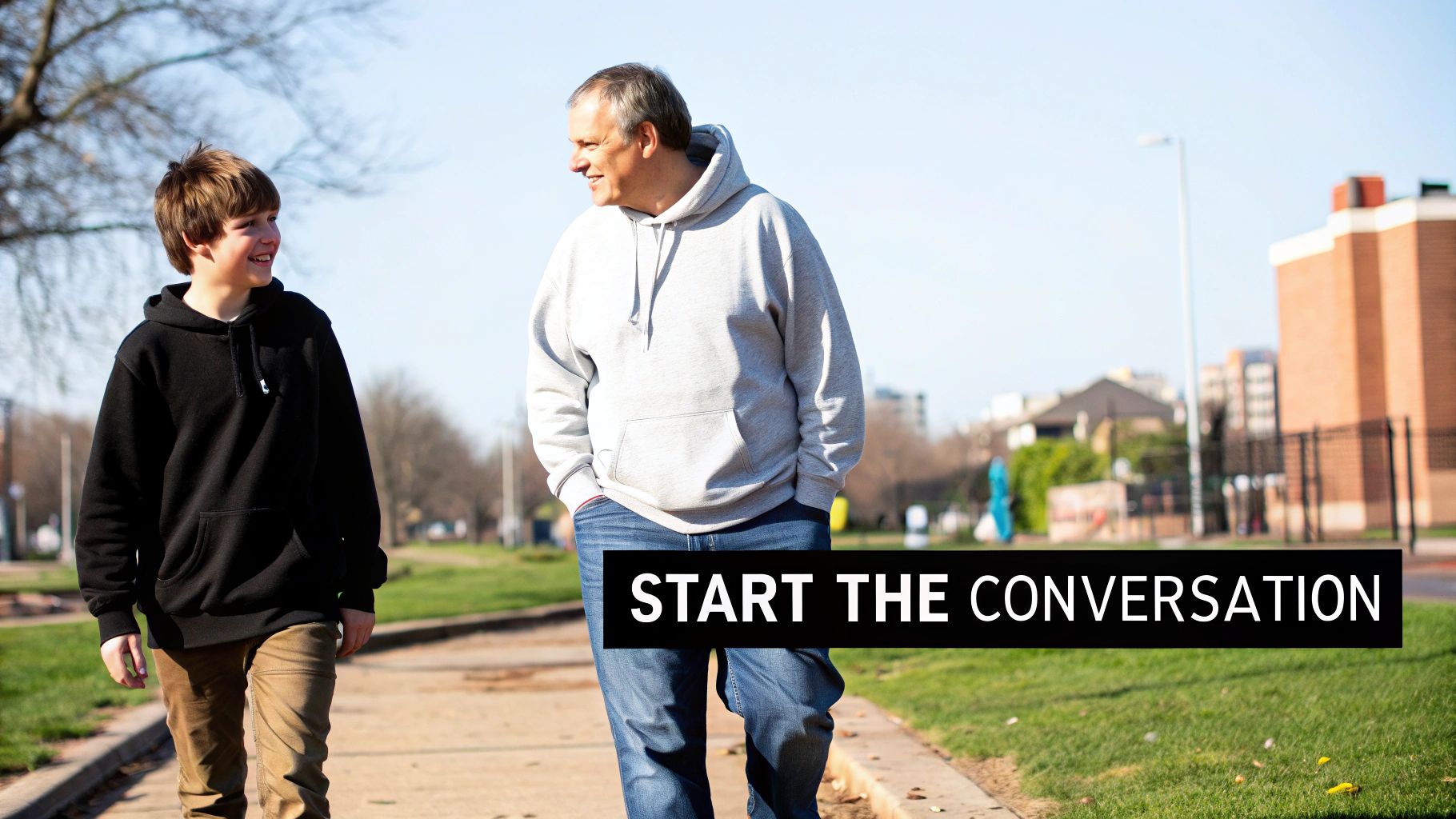 A smiling boy and man walk together on a sunny day, with the text 'START THE CONVERSATION'.