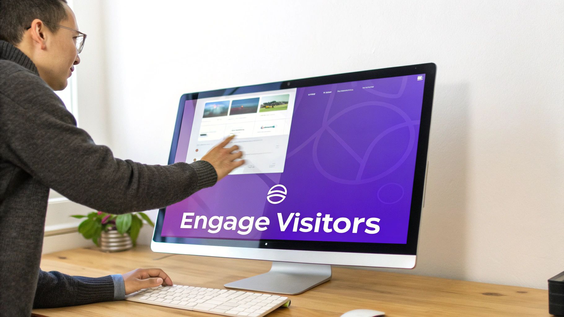 A man in glasses interacting with a computer screen showing 'Engage Visitors' and a website interface.