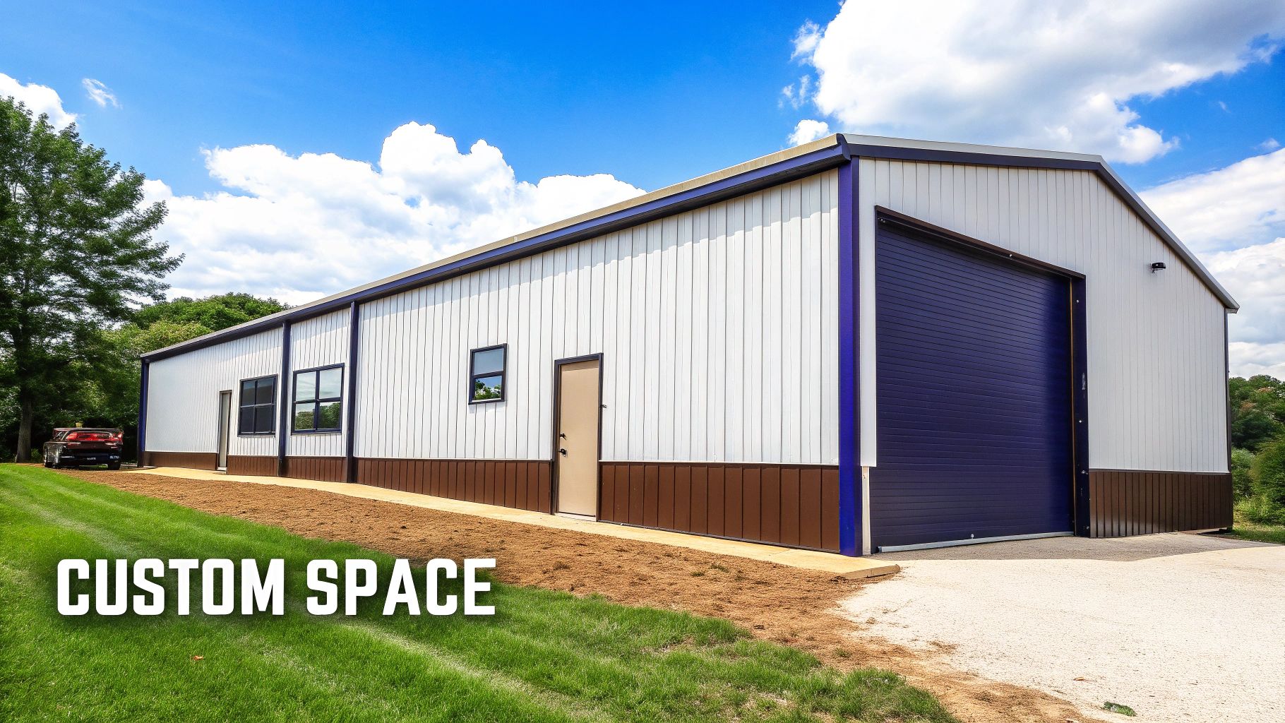 A custom metal building with stone facade and large windows.