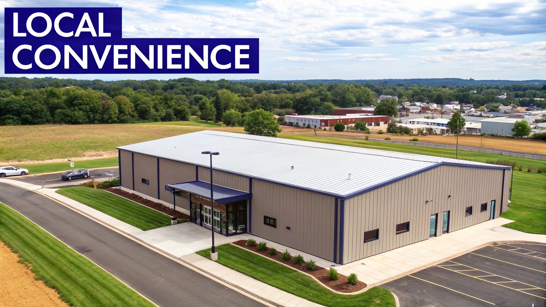 A newly constructed metal shop building with large garage doors.