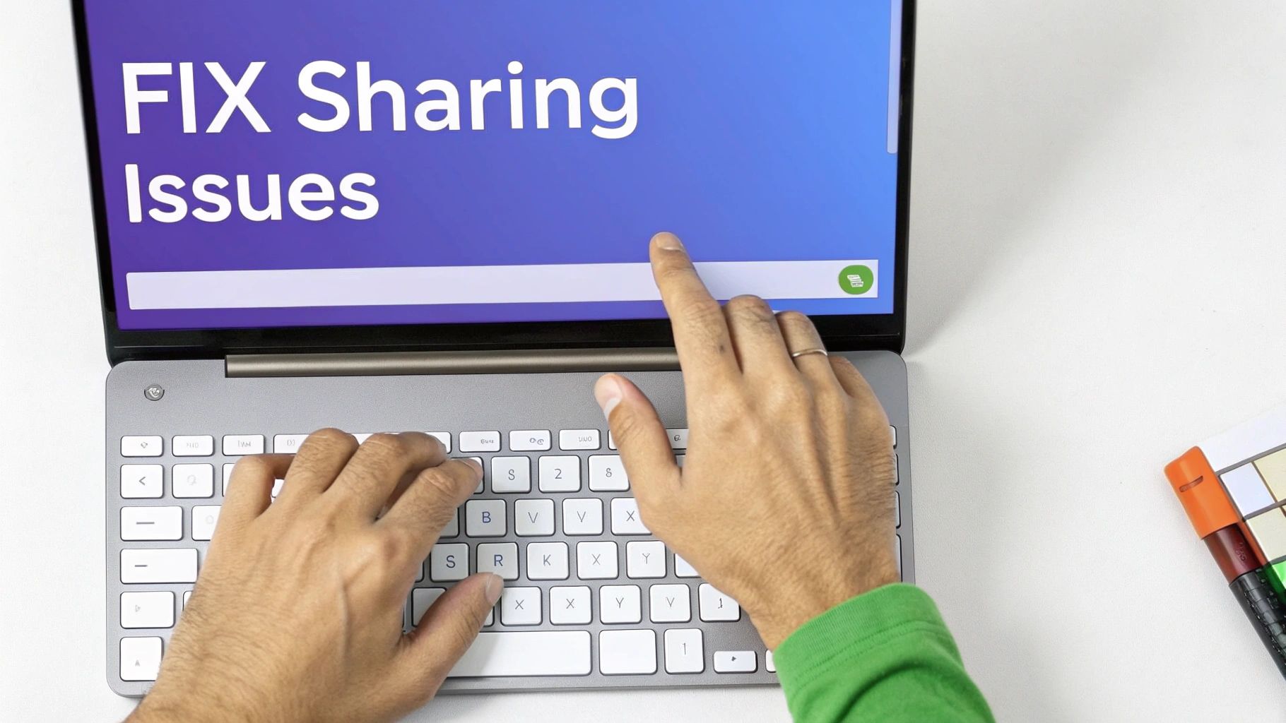 Hands typing on a laptop keyboard with 'FIX Sharing Issues' displayed on the screen, a finger pointing.