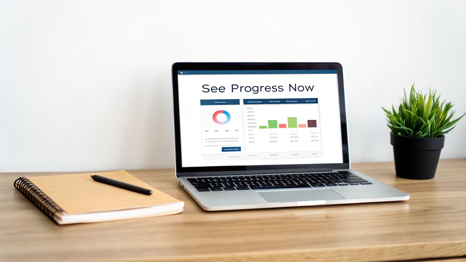 Laptop displaying a 'See Progress Now' dashboard with charts, a notebook, and a plant on a desk.