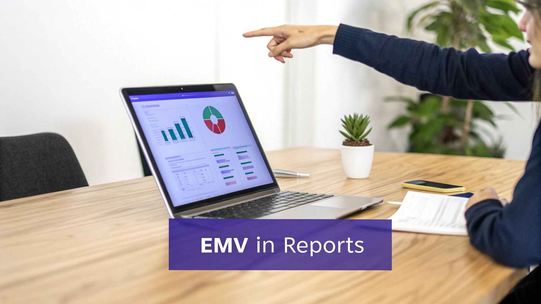 A person points at a laptop displaying data visualizations and reports, discussing business analytics.
