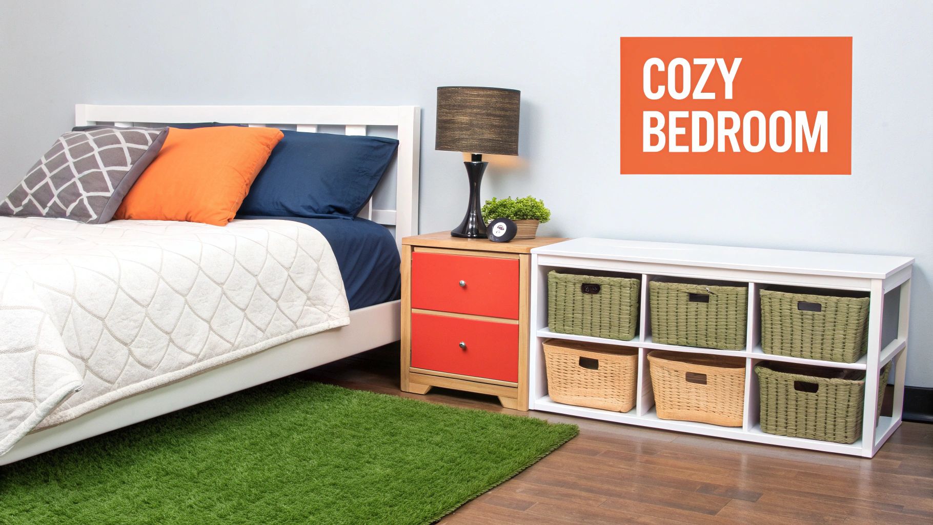 A cozy bedroom with a white bed, orange and gray pillows, a nightstand, and a storage unit with baskets.