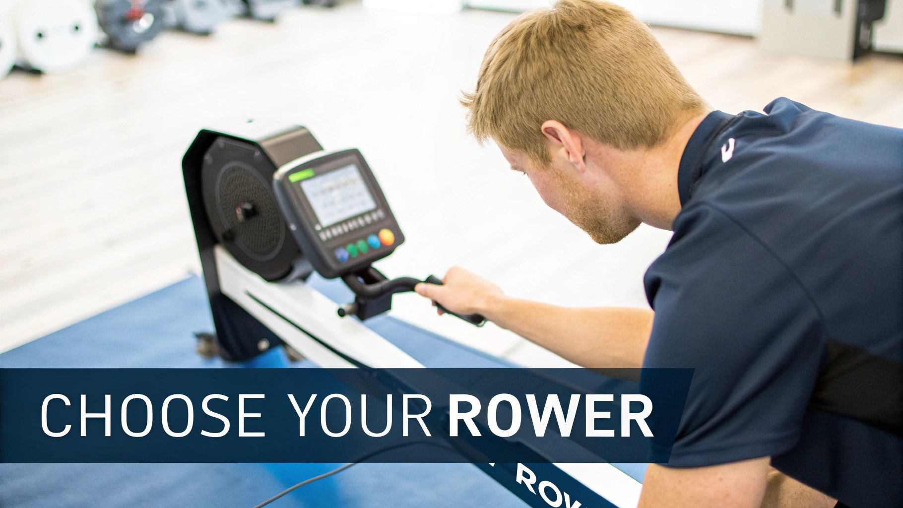 A man in a navy shirt is intensely using a rowing machine, looking at its display screen.