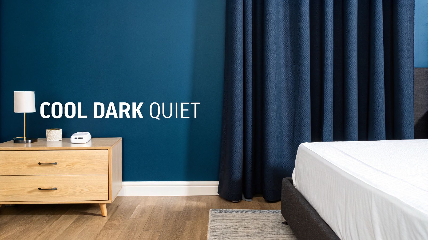 A serene, dark bedroom with blackout curtains and a neatly made bed, optimized for deep sleep.