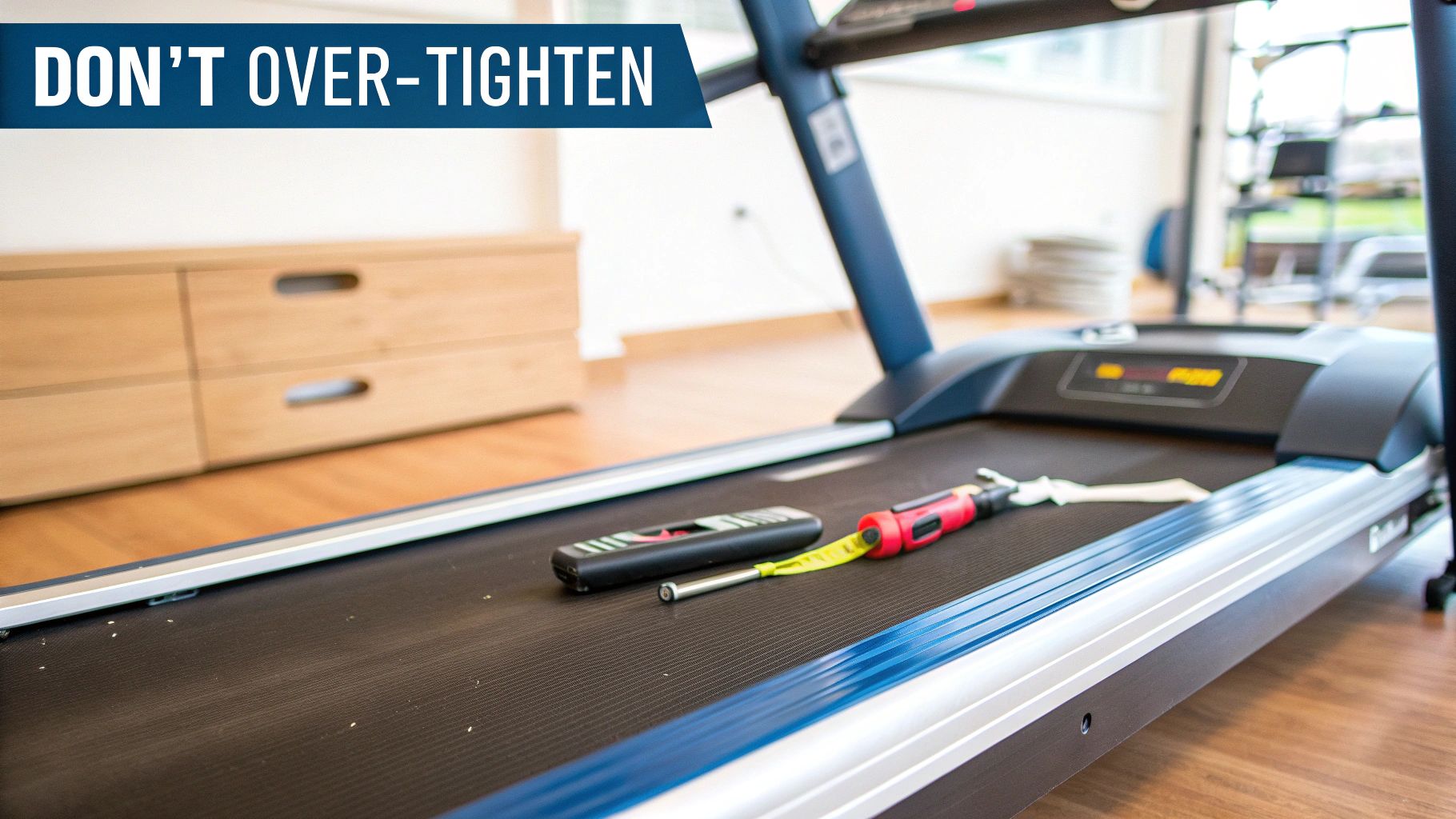 A treadmill belt with adjustment tools and a warning message: DON'T OVER-TIGHTEN.