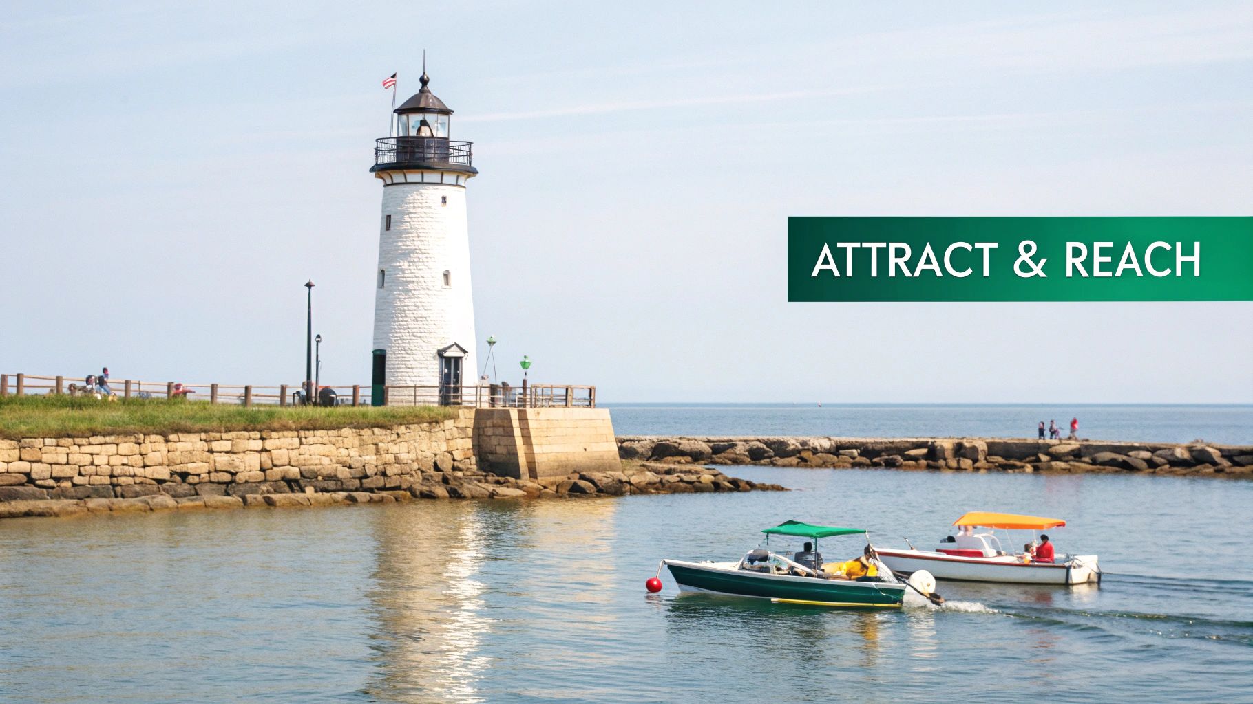 White lighthouse on stone jetty with boats in harbor representing attract and reach marketing concept