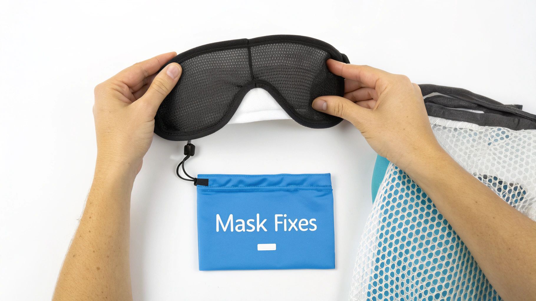 Hands hold a black mesh sleep mask above a blue "Mask Fixes" pouch on a white background.
