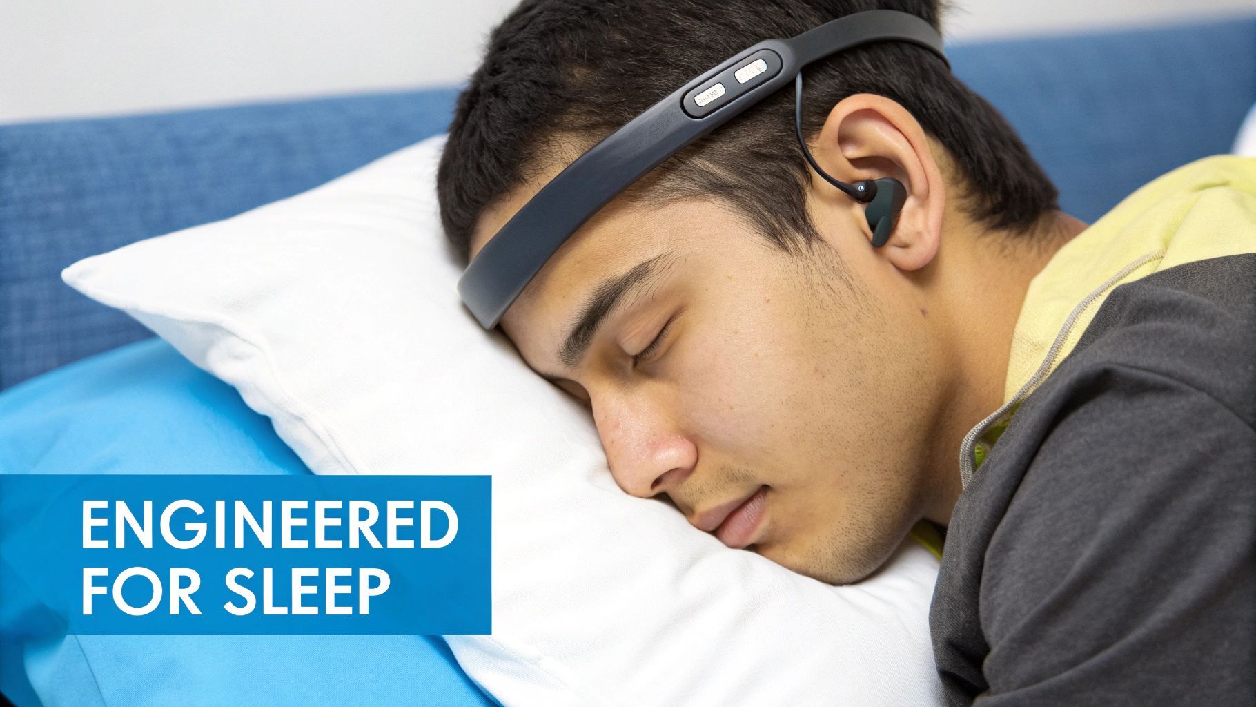 Close-up of a person sleeping with a smart sleep headband and earbuds for monitoring.