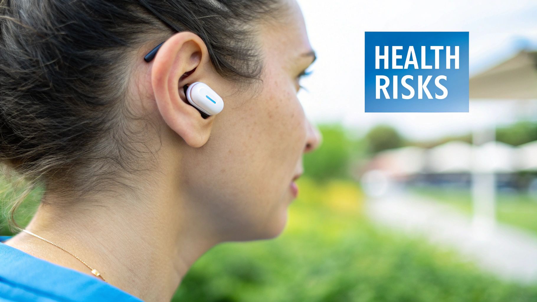 A person looking concerned while holding a pair of bulky headphones near their ear.