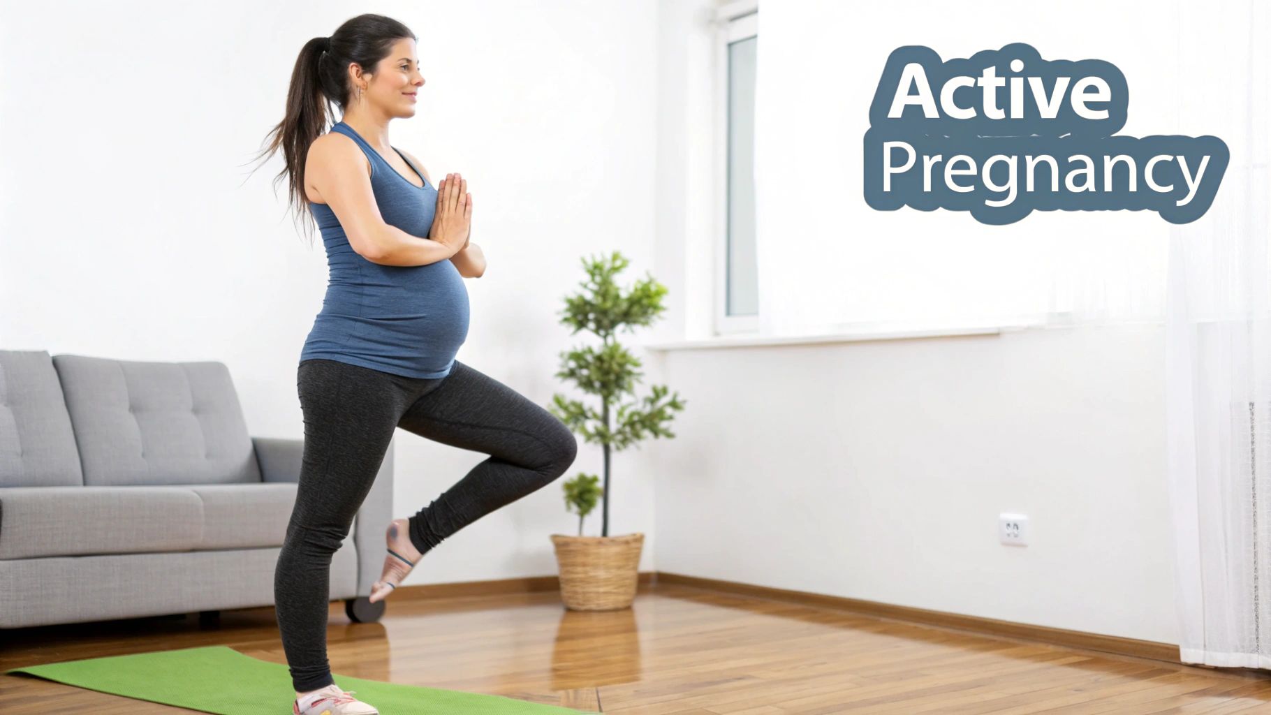 A pregnant woman in blue activewear practices yoga on a mat, promoting active pregnancy.