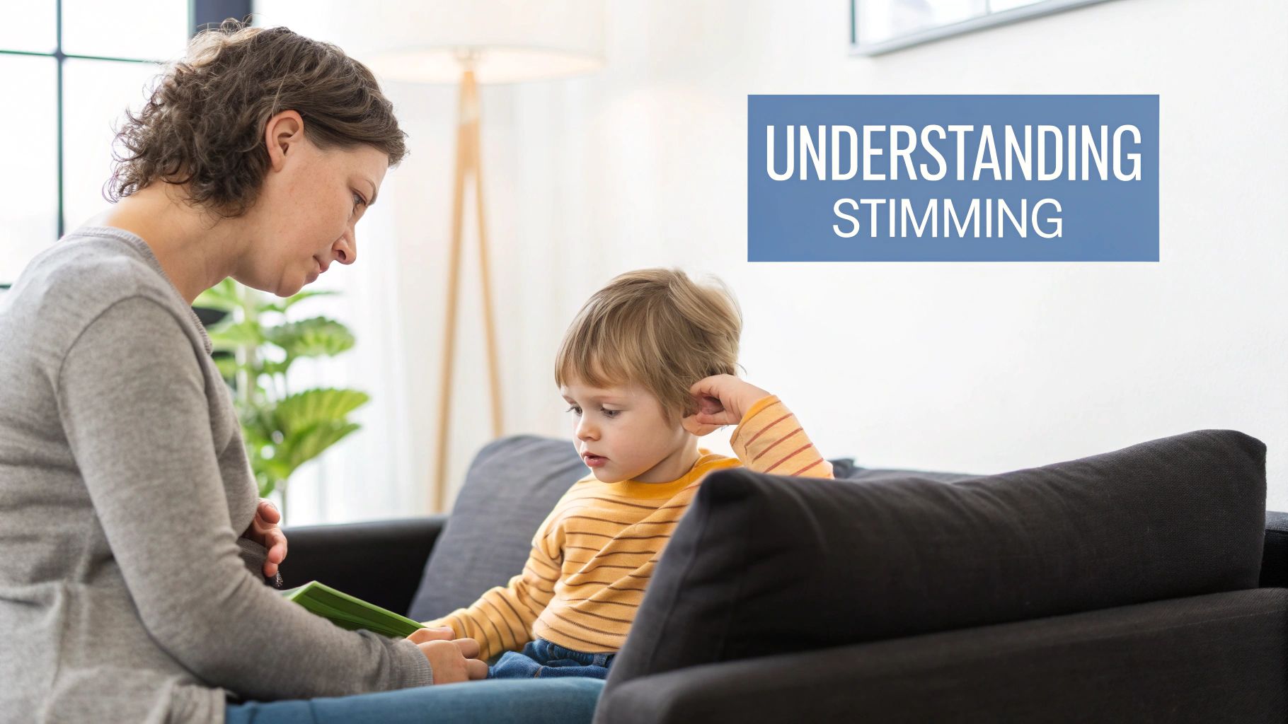A mother reads a book to her young child on a sofa, with a banner "Understanding Stimming".