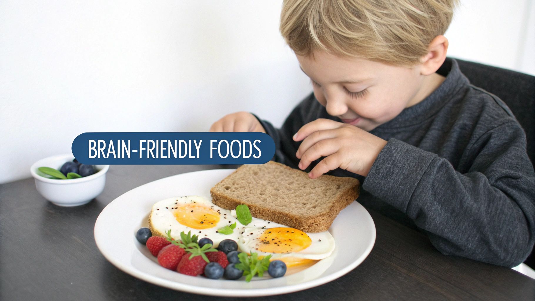 An occupational therapist helps a child on a sensory swing in a brightly lit room with colorful mats.