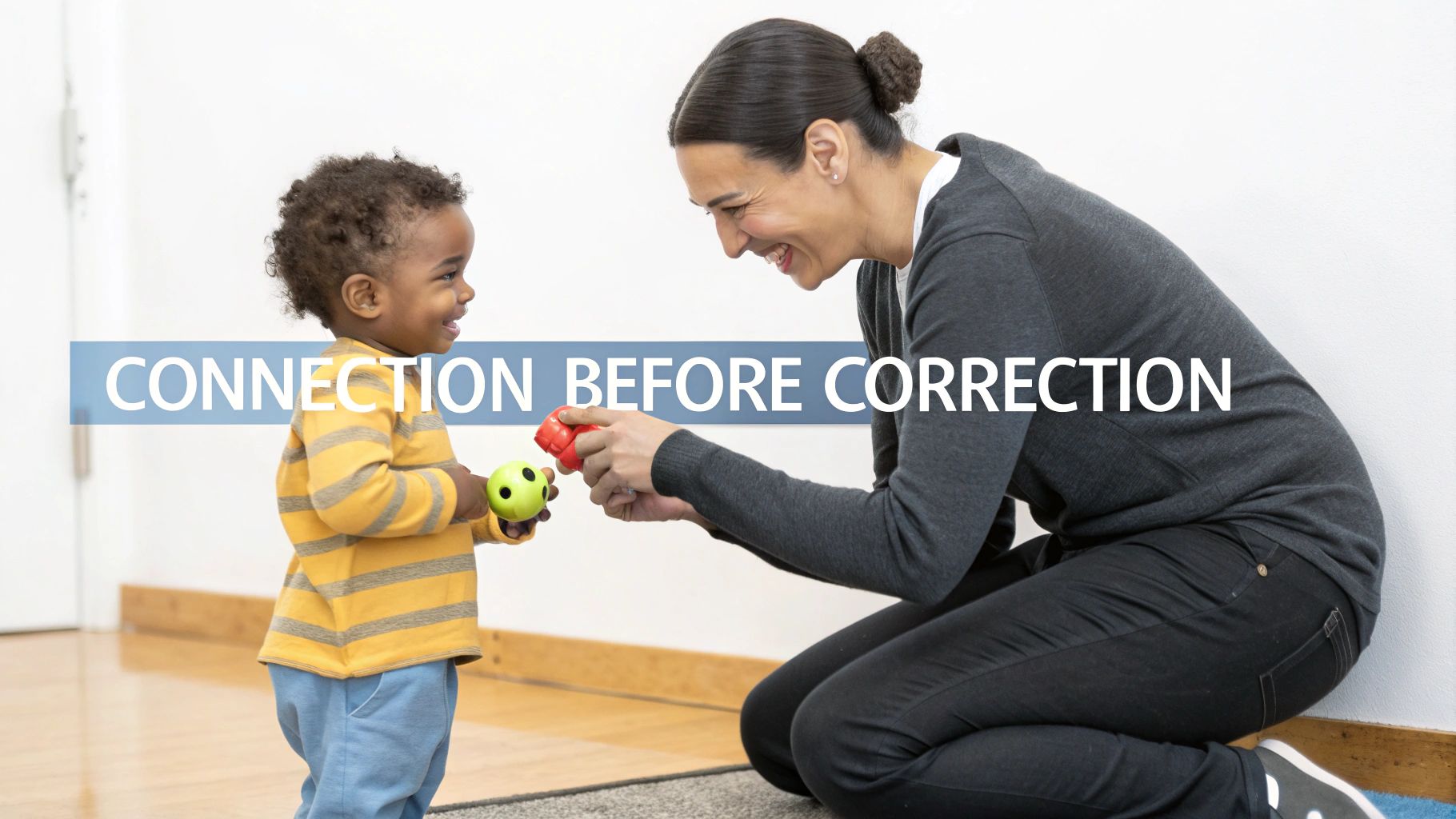 A parent comforting a toddler having a tantrum on the floor.