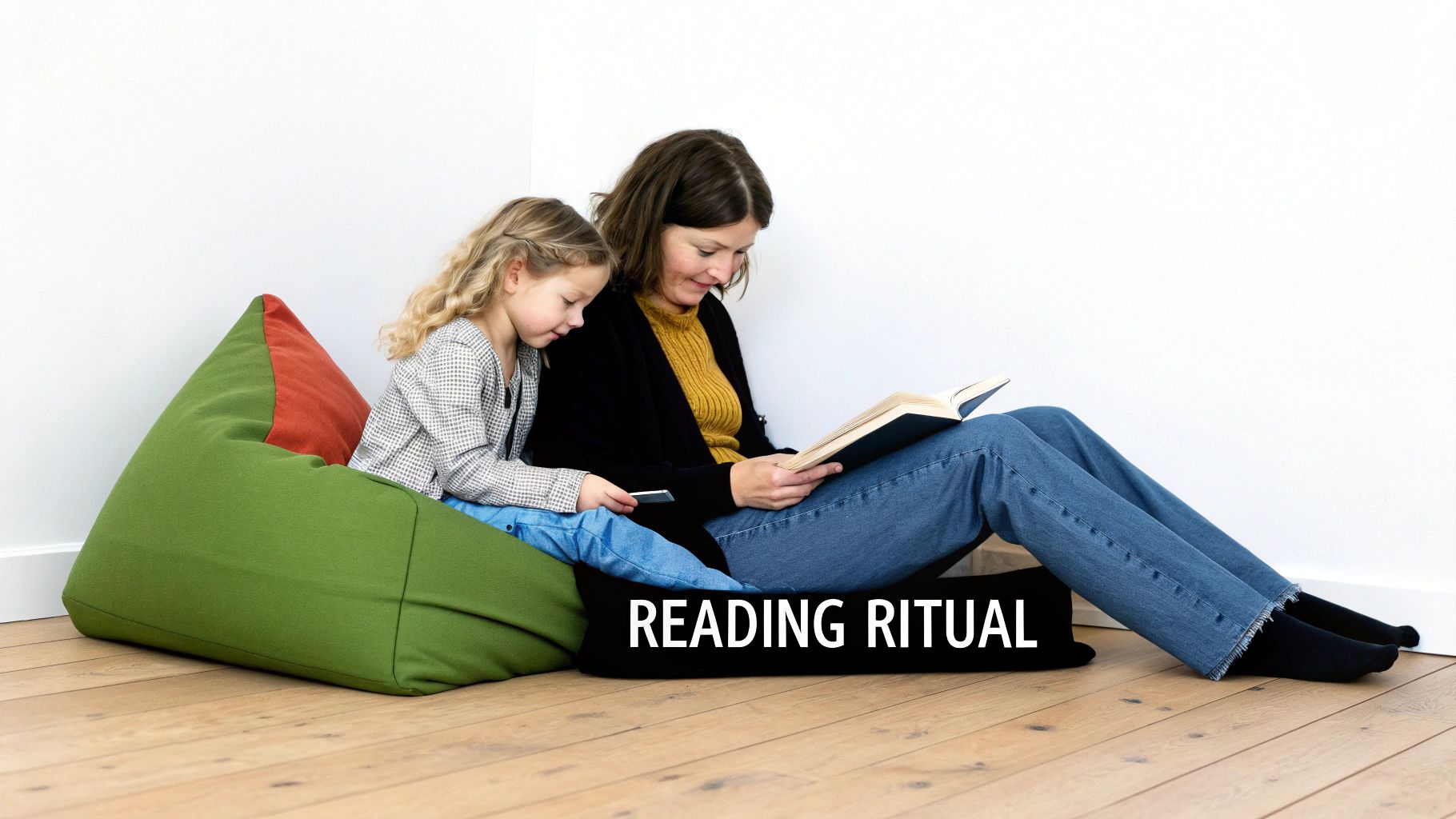 A mother and daughter sit together on a green and red beanbag, reading during their ritual.