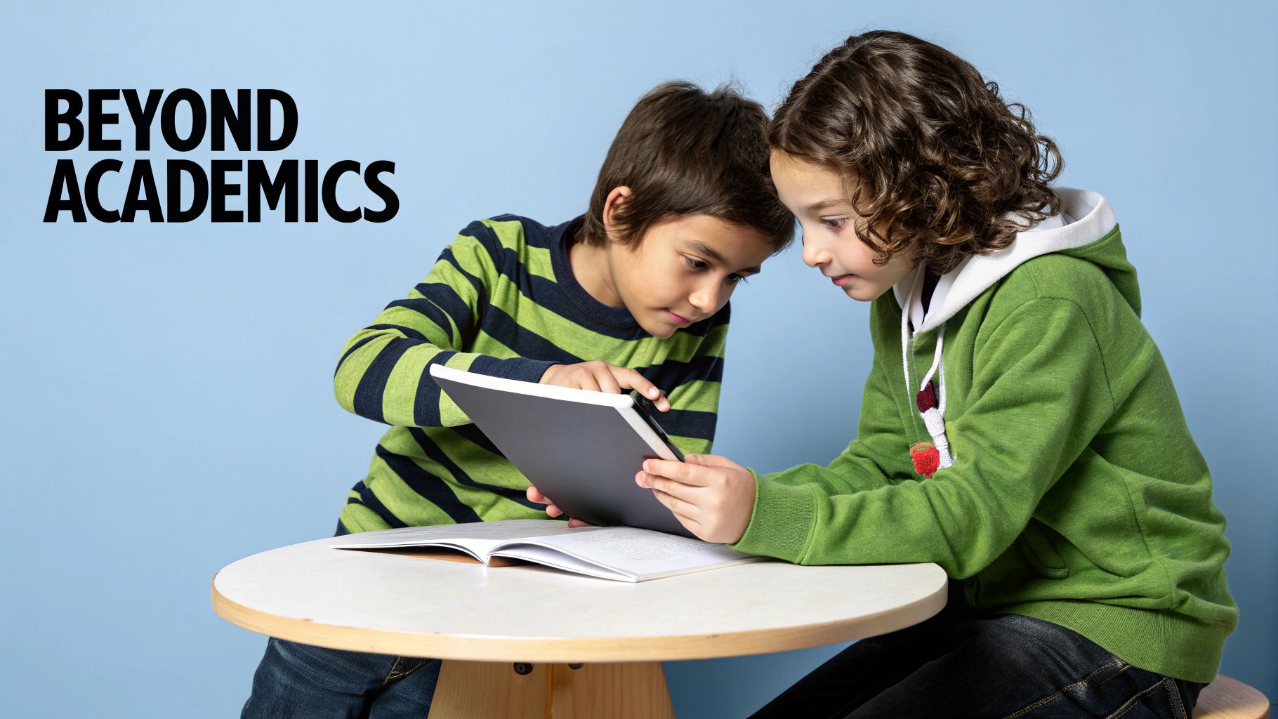 Two children working together and celebrating while playing a collaborative video game.