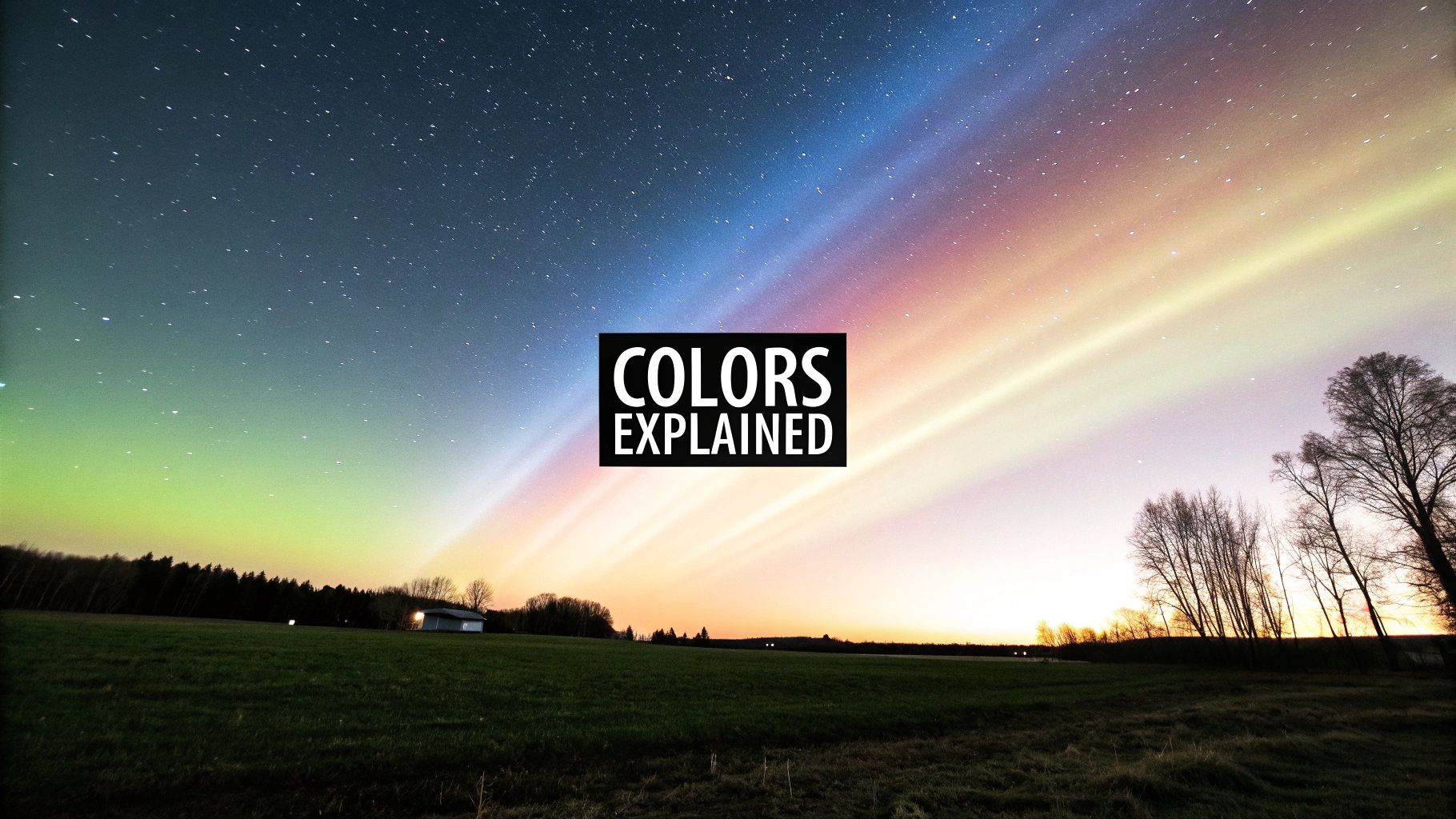 Vibrant aurora borealis colors streaking across a starry night sky above a green field.
