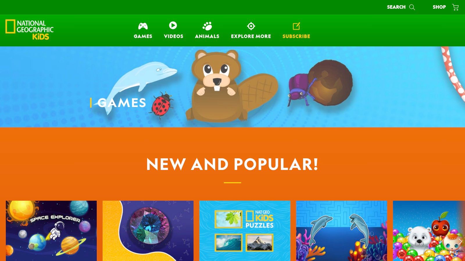The homepage of National Geographic Kids, showing vibrant, animal-themed games and quizzes.