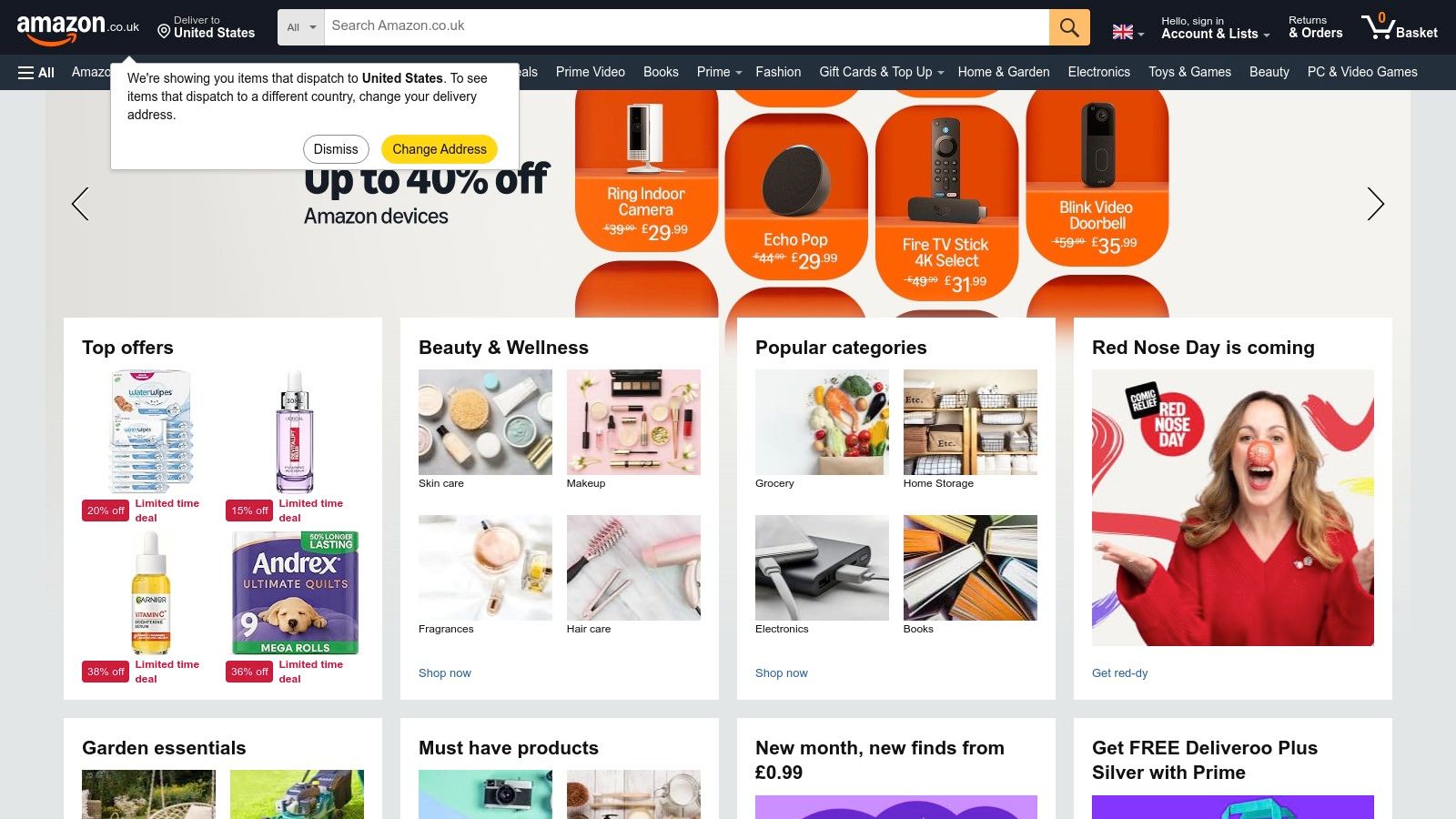 Amazon UK homepage showing a search bar and various product categories