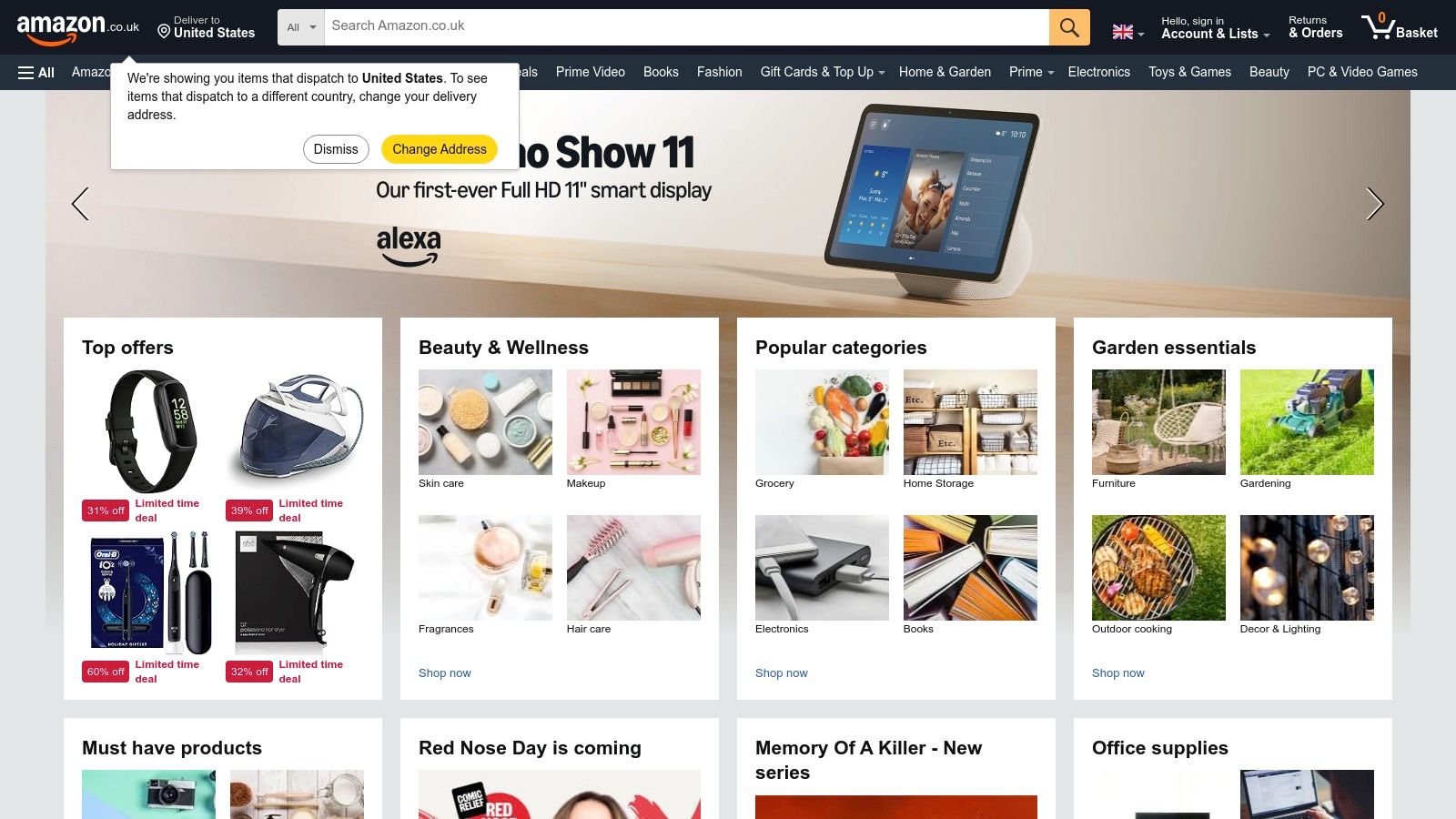 A child and parent happily shopping online for games on a laptop.