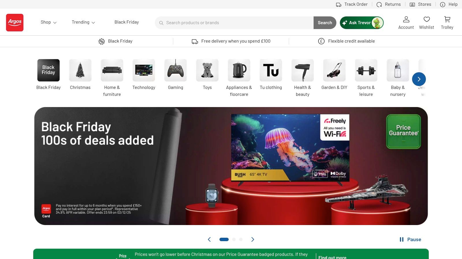 A screenshot of the Argos website homepage, featuring its distinctive green and red branding and a prominent search bar for finding products like children's games.