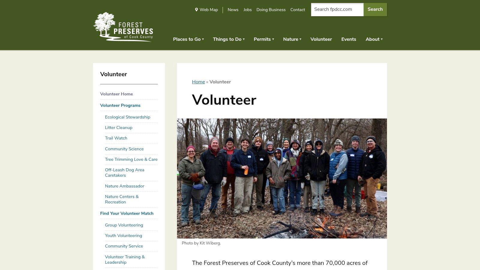 Volunteers working together during an event with the Forest Preserves of Cook County (FPDCC).