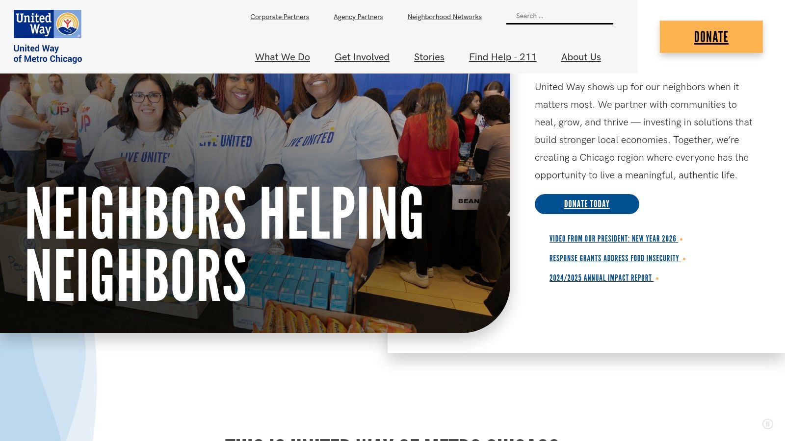 A group of volunteers in blue shirts from United Way of Metro Chicago working together on a community project.