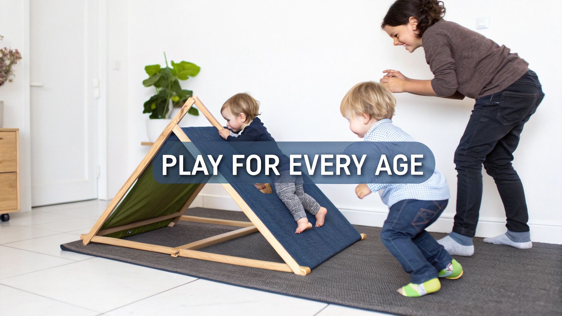 Three happy children of different ages play on a foldable wooden climbing structure indoors.