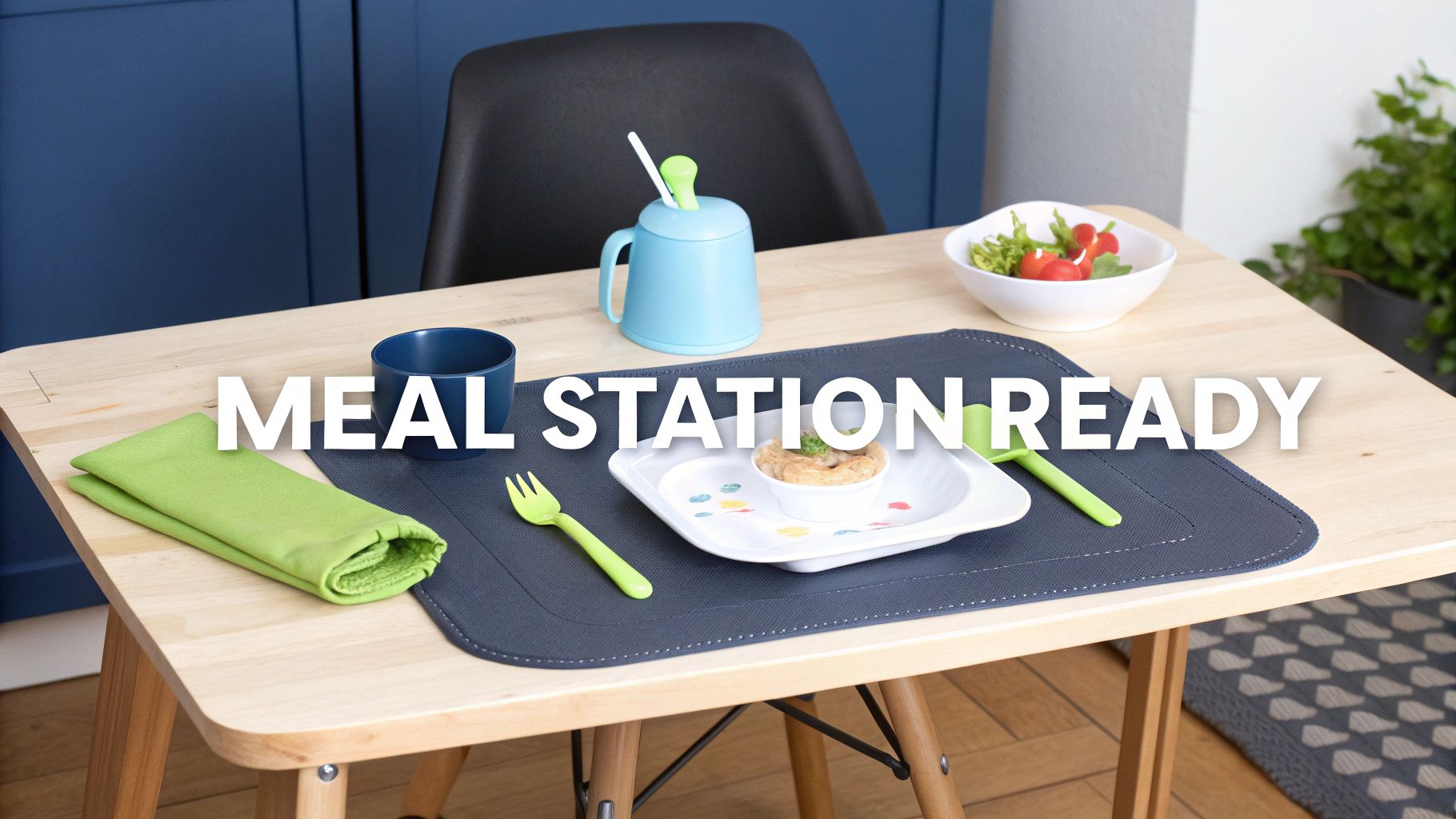 A complete Montessori weaning table setup with child-sized utensils, a placemat, and a small pitcher on a wooden table.