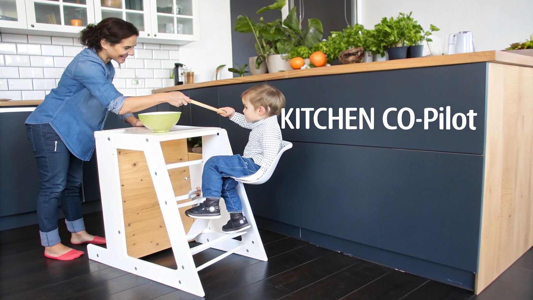 A happy mother and her toddler engage in cooking using a white kitchen helper tower.