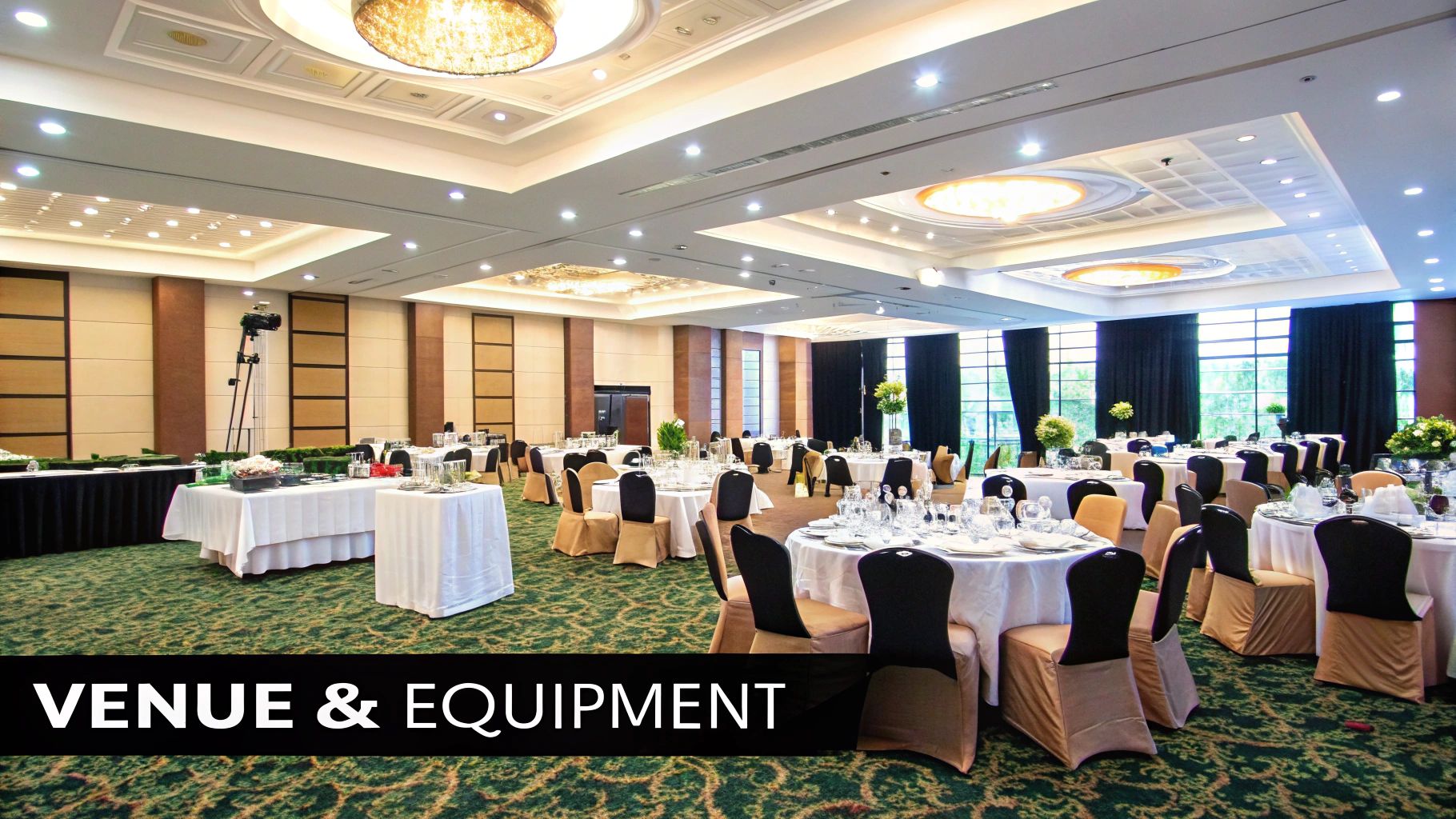 A vibrant spread of catered food including salads, grilled meats, and appetizers on a table.