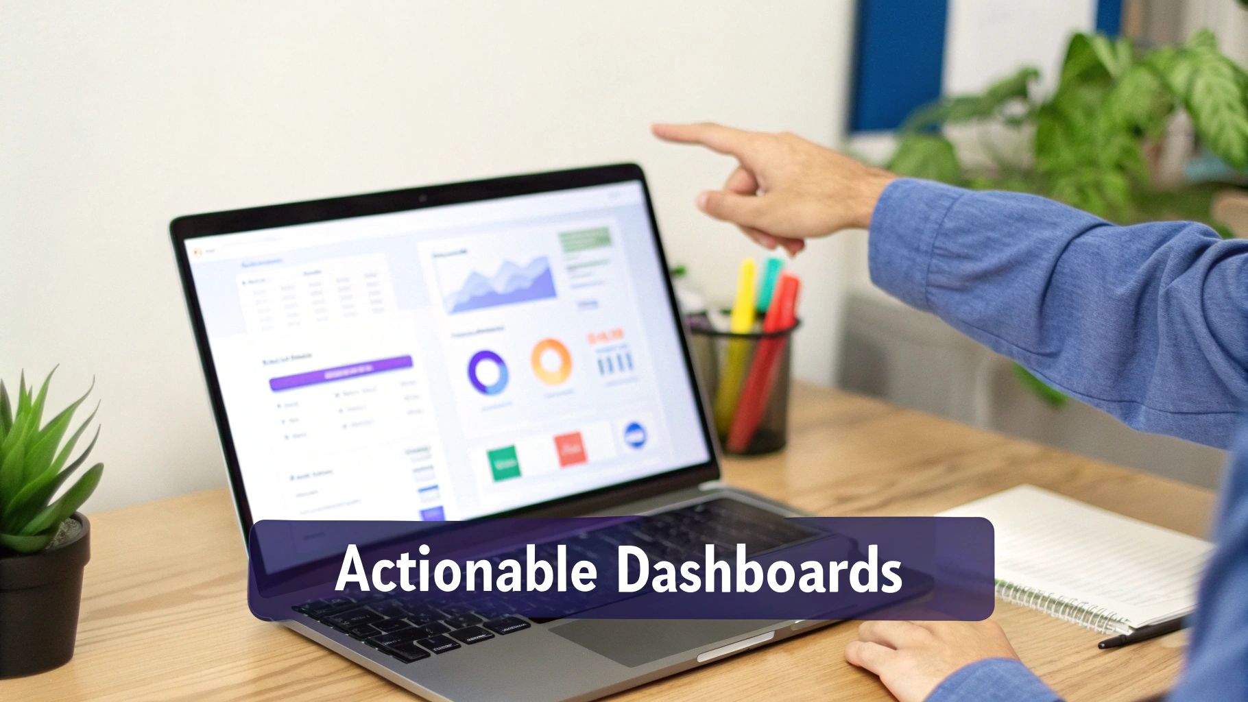 A person points at a laptop displaying an actionable data dashboard with various charts.