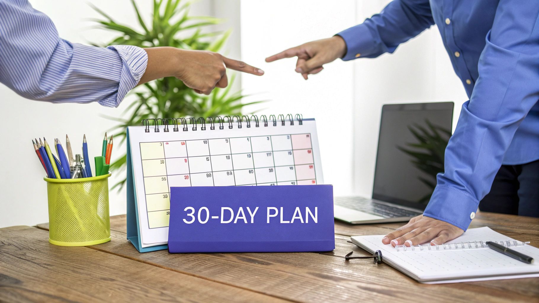 A person at a desk thoughtfully looking at a laptop, ready to implement a new strategy.