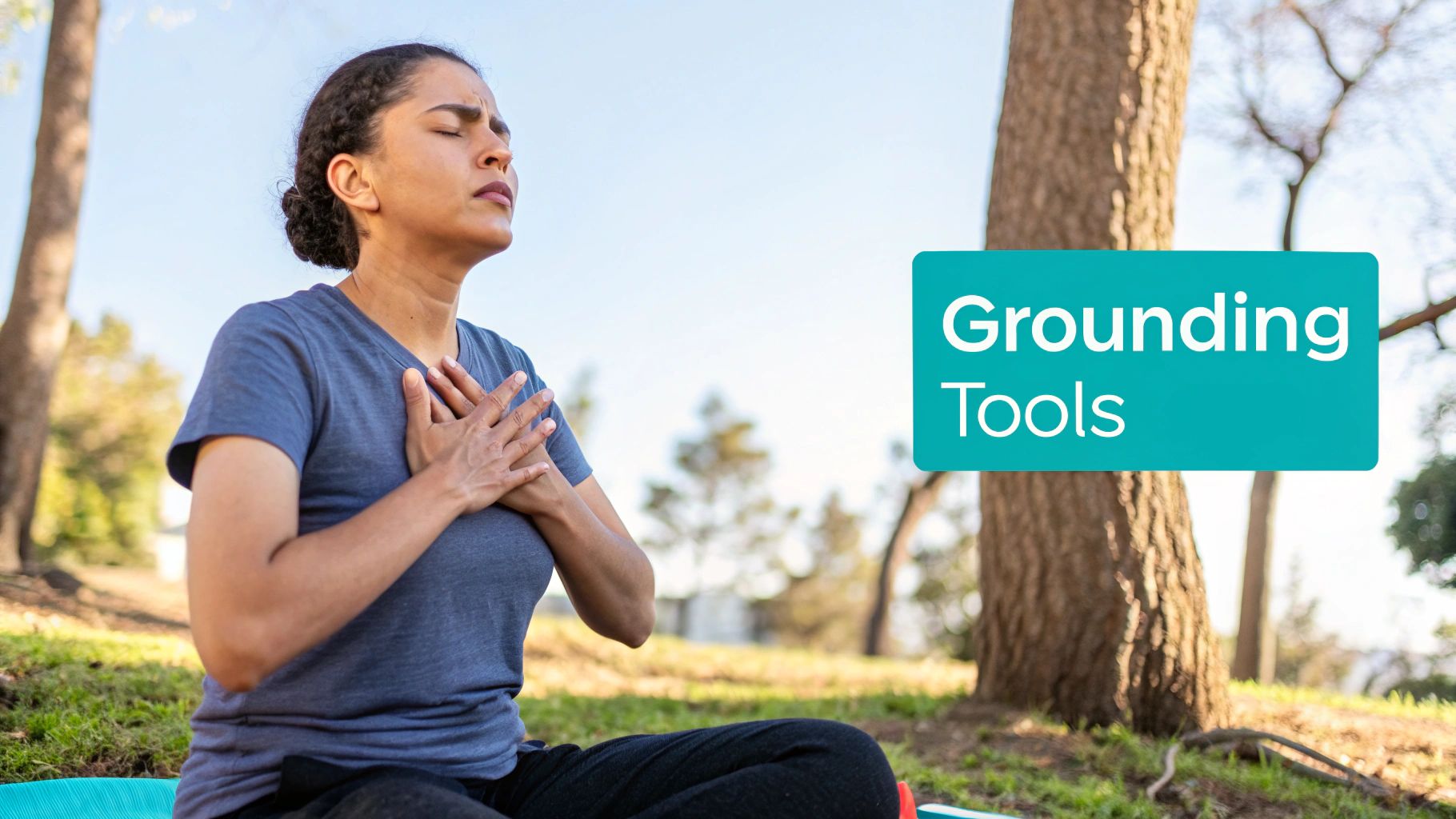 A person is practicing a calming breathing exercise in a busy city park, demonstrating that anxiety management tools can be used anywhere.