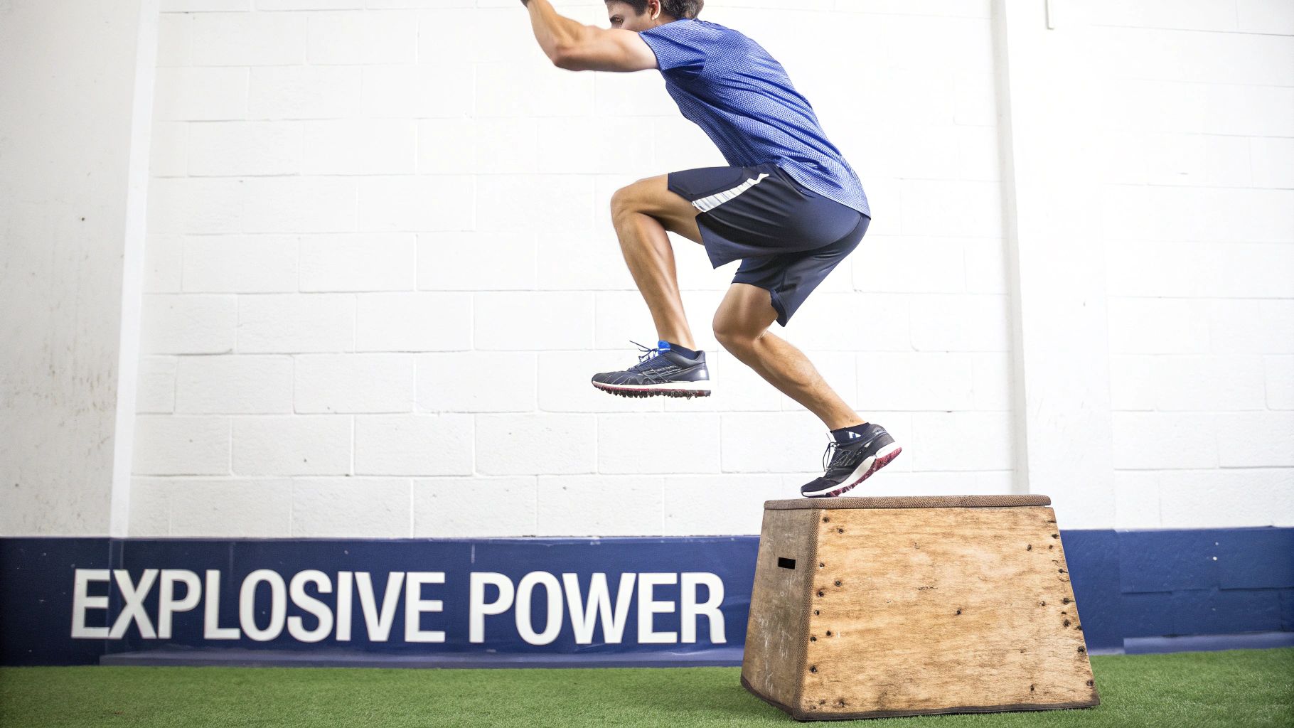 A woman performing a single-leg deadlift with a kettlebell in a gym.
