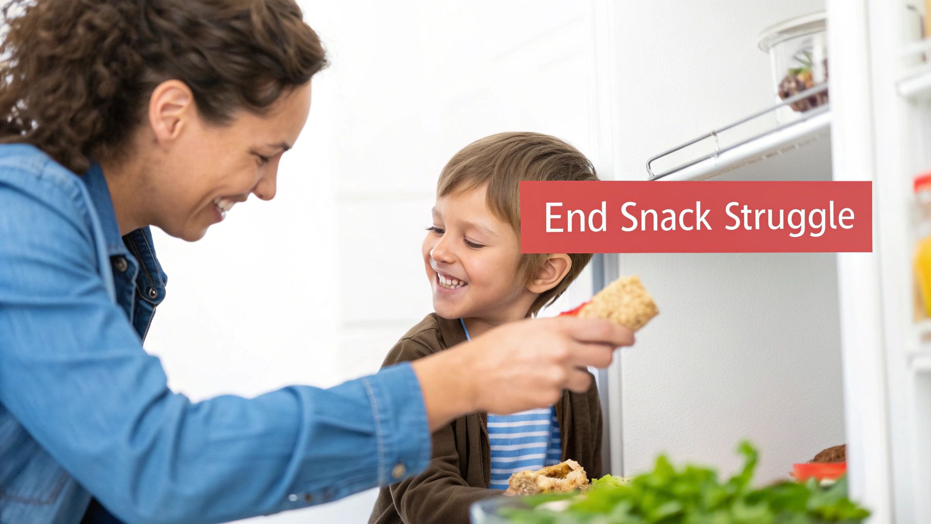 A child happily eating a healthy snack bar with a variety of other snacks around.
