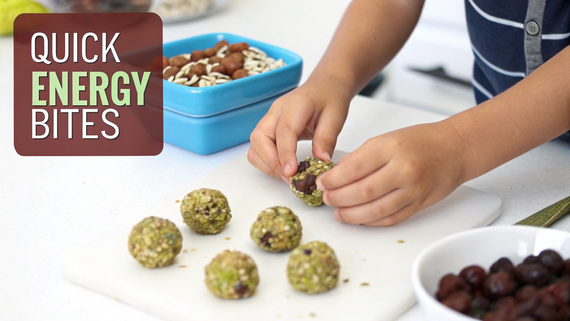 Child's hands rolling green energy bites on a white board with ingredients in the background.