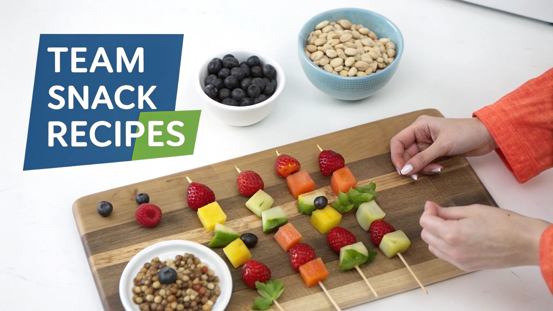 A person arranges colorful fruit skewers on a cutting board, surrounded by bowls of berries and nuts.