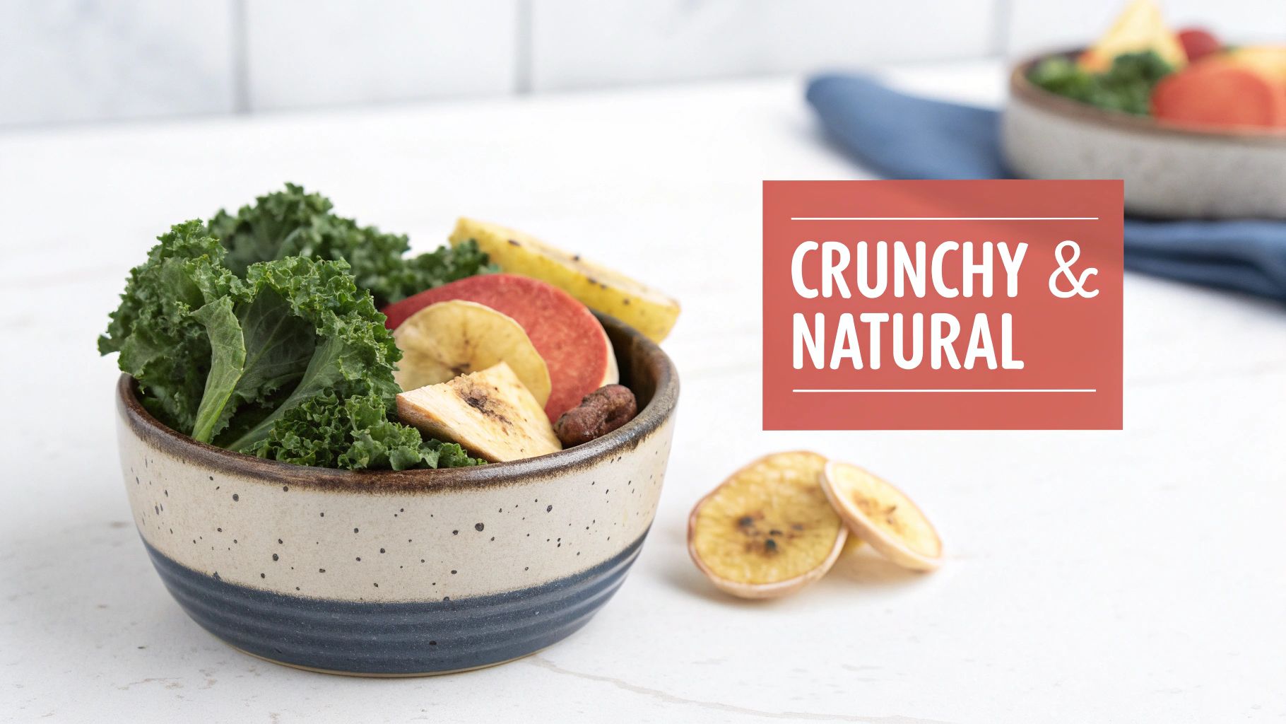 A colorful bowl of fresh kale, dried banana, and apple slices for a healthy, crunchy snack.