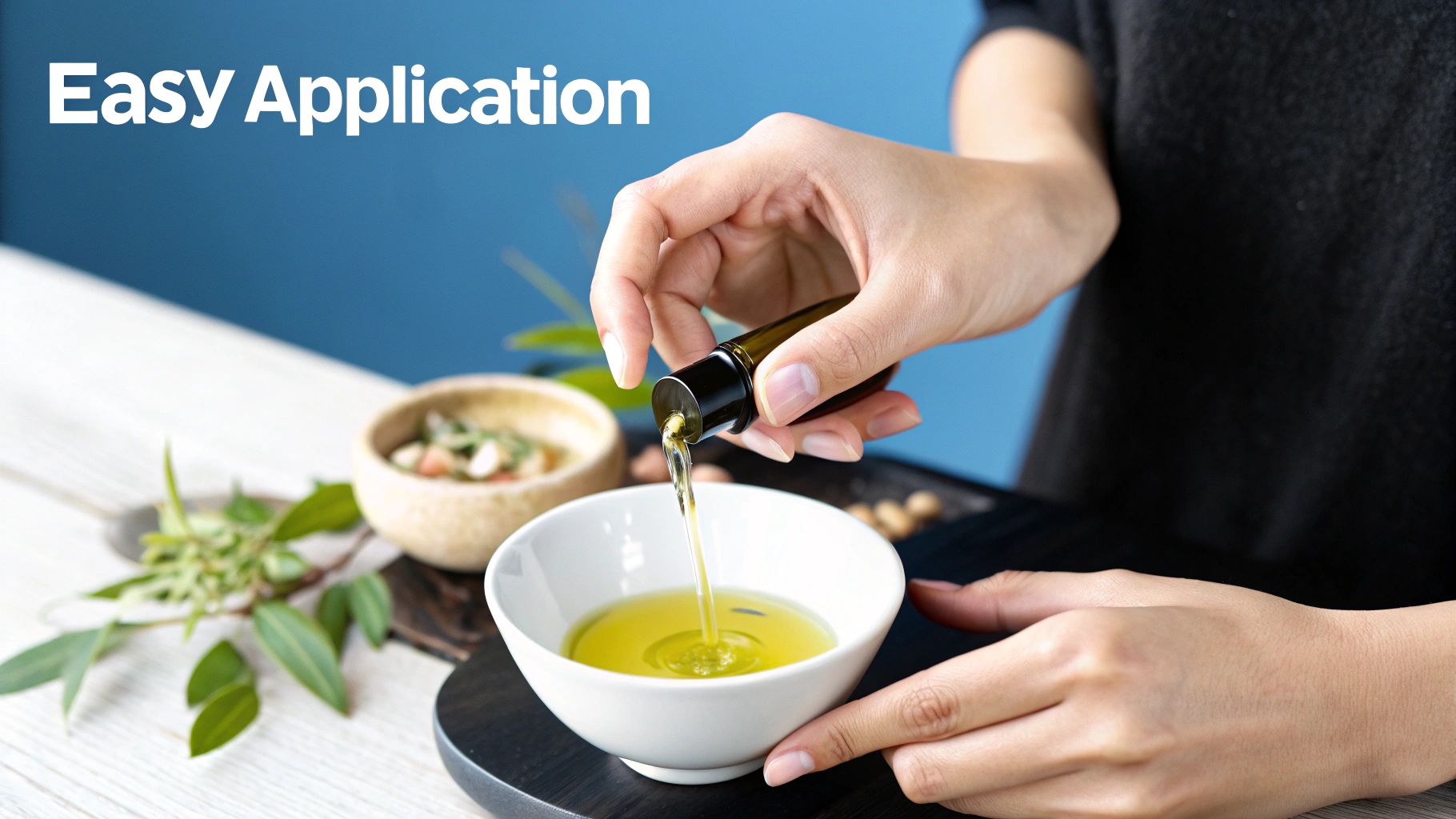 A person massaging their scalp with an oil blend.