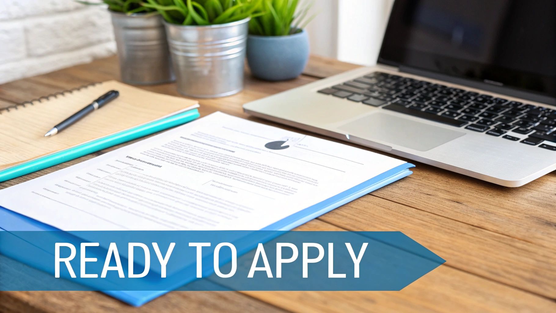A person looking at a laptop and holding a mug, suggesting they are planning their housing search.