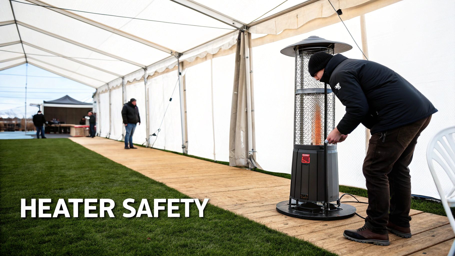 A man ensures heater safety by adjusting a gas patio heater inside a large white event tent.