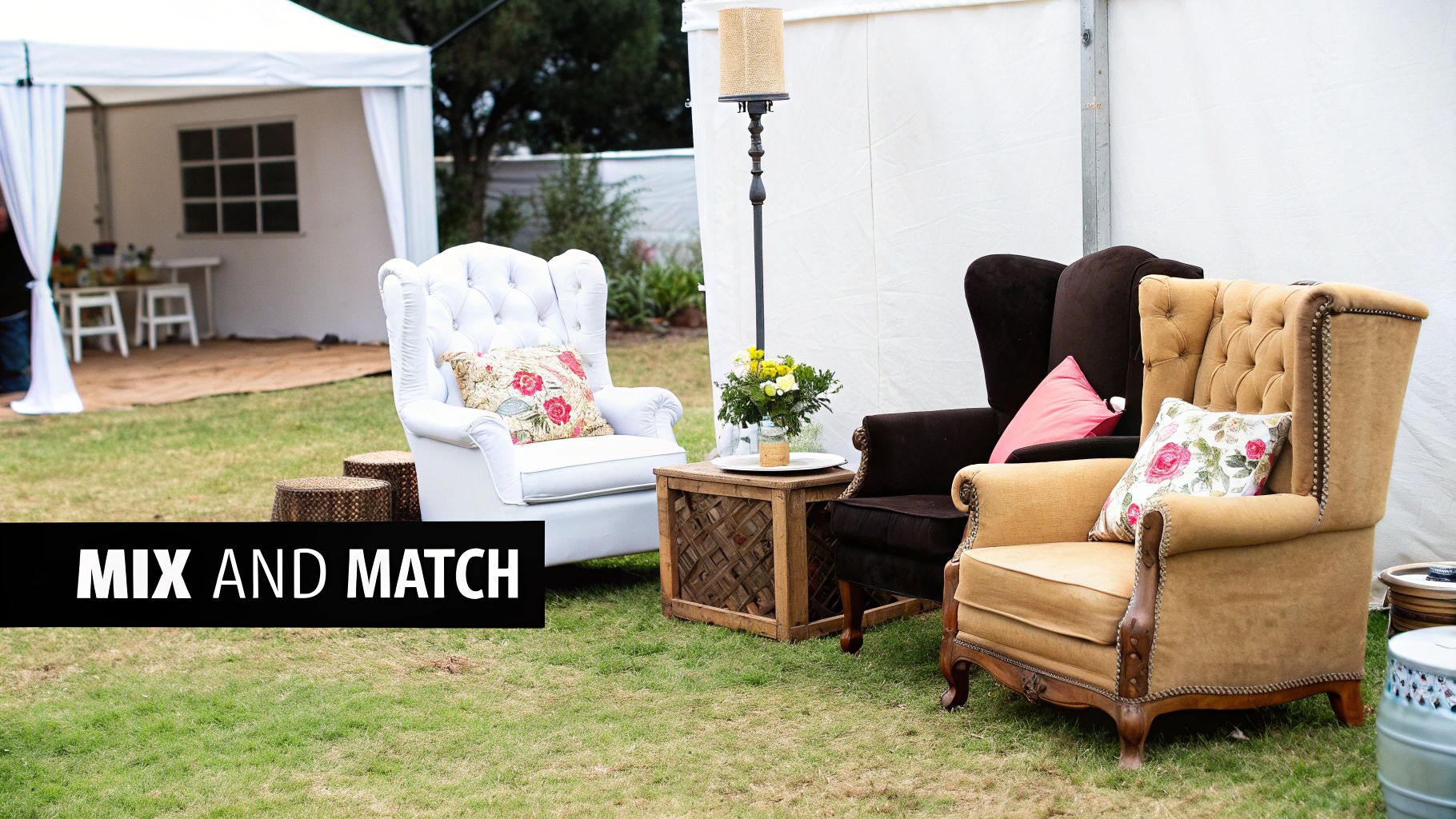 A collection of mix and match armchairs in white, brown, and tan set up as an outdoor lounge area for an event.