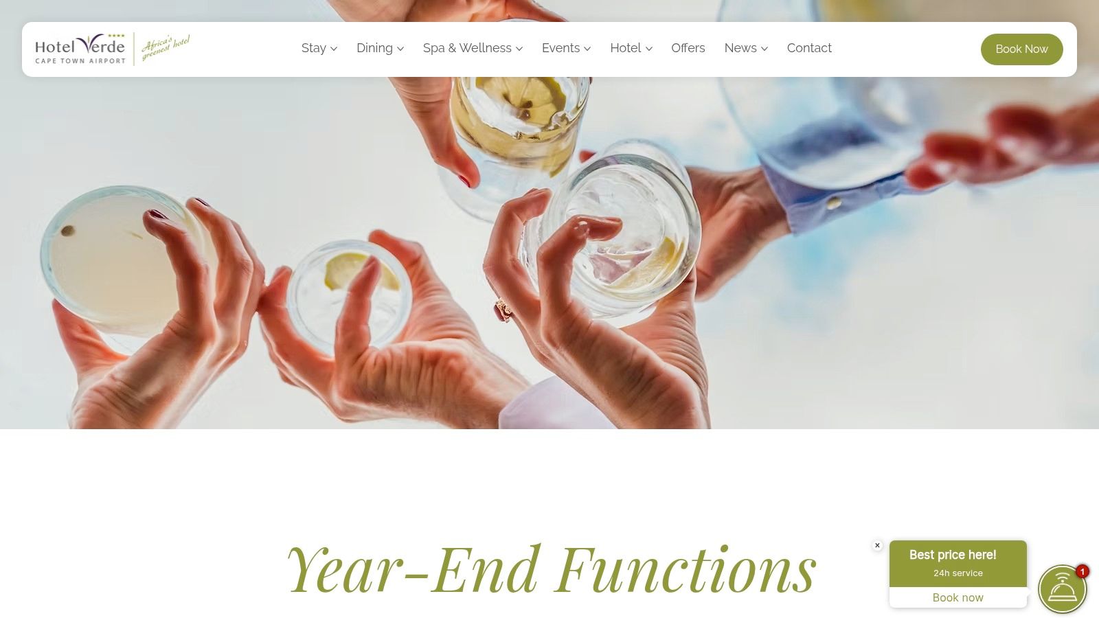 A group of colleagues toasting with drinks at a sophisticated year end function in Cape Town.