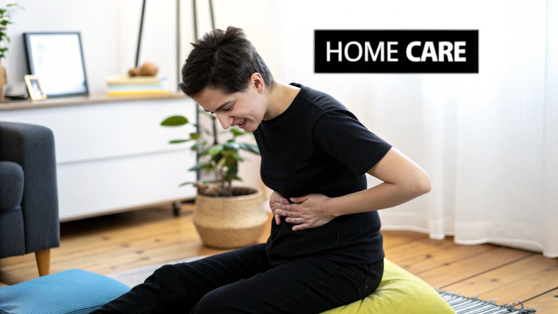 A woman peacefully practicing self-massage on her abdomen in a bright, calm room.