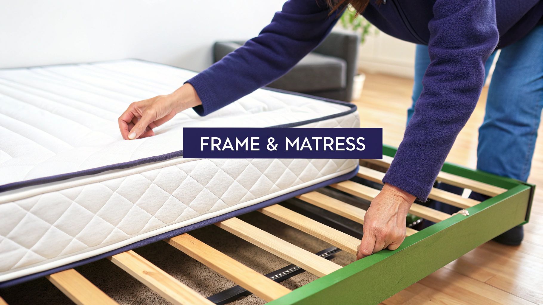 Installing a new white mattress onto a green double bed frame with wooden slats.