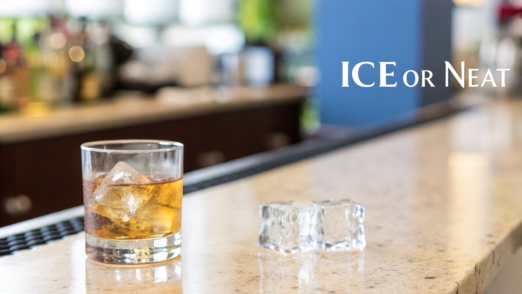 A glass of amber liquor with ice cubes sits on a bar, with text 'ICE or NEAT' in the background.