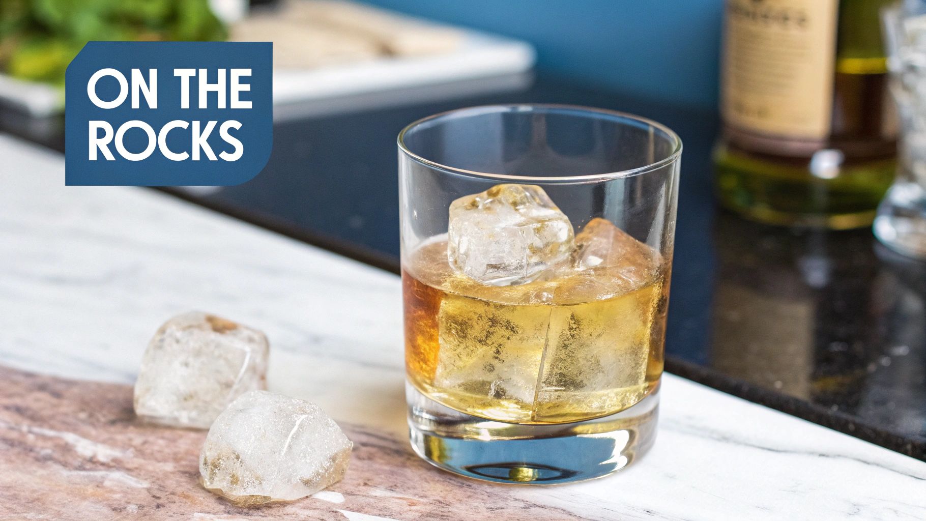 A glass of whiskey served on the rocks with a large, clear ice sphere, highlighting its rich amber color.